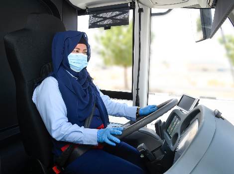 an image of RTA female bus driver