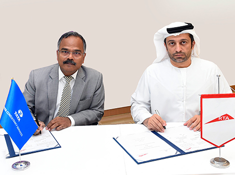 an image of RTA and TATA representatives sign a MoU to support research & development in smart monitoring of drivers’ conduct