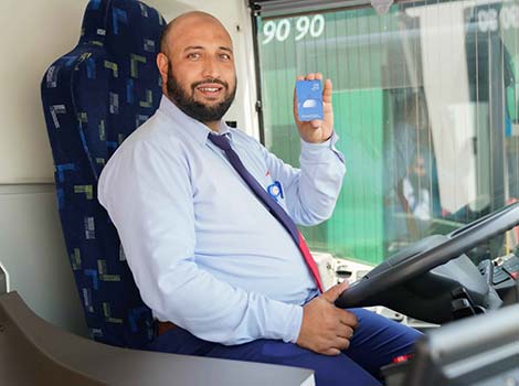 an image of a Driver receiving a nol card