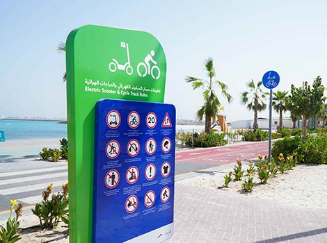 an image of Beach instruction and with eScooters and cycle track rules
