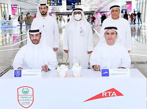 an image of Dhahi and Al Tayer and Al Muhairi during the signing of the MoU