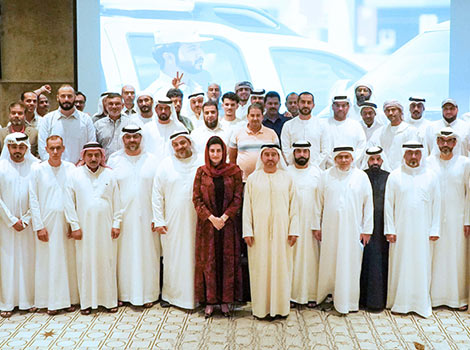 an image of a group photo after the system was launched