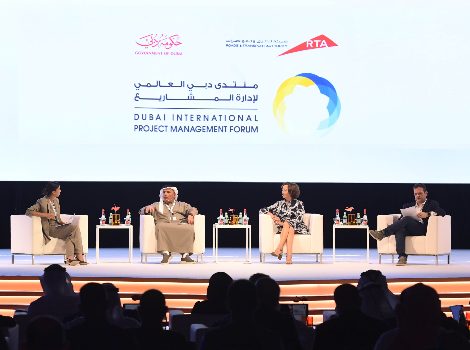 an image of Al Tayer, Mary and Mark attending the main session of the forum