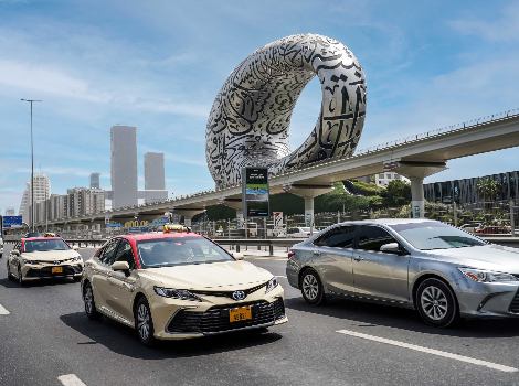 an image showing RTA Dubai Taxi vehicles