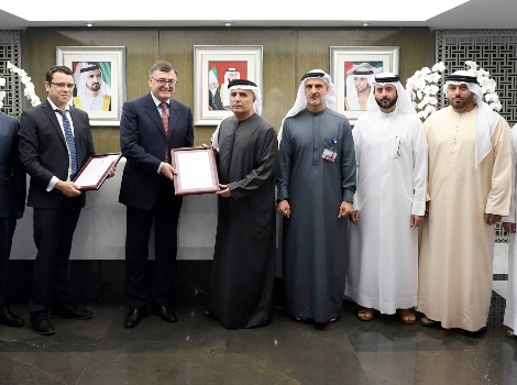 an image of Al Tayer while accepting the ISM certificate of the Dubai Ferry at RTA