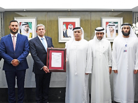 an image of Al Tayer receiving the ISO Certificate