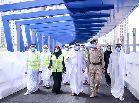 an image of Al Tayer and Al Marri inspecting pedestrian crossings