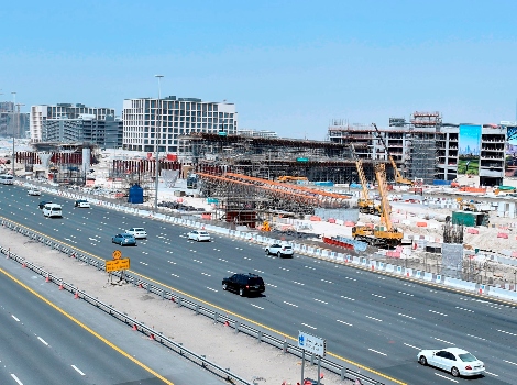 an image of work progressing fast in the construction of bridges leading to Dubai Hills Mall