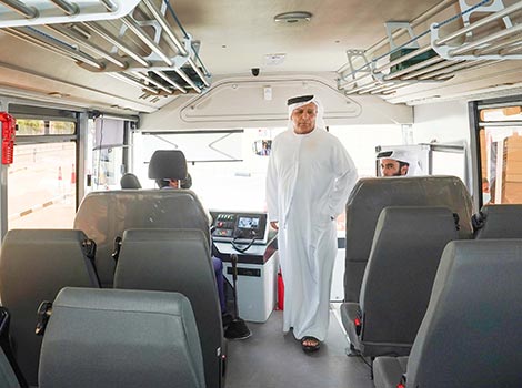 an image of Al Tayer inspecting the latest Dubai Taxi Corporation school buses