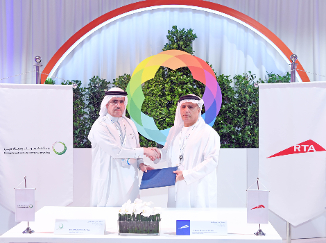 an image of Mattar and Saeed Al Tayer signing the MoU