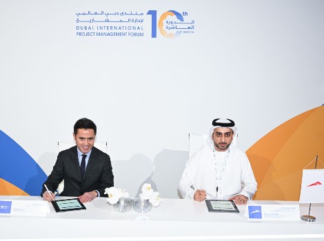 an image with the team signing MOU with PMI