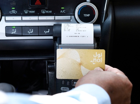 an image of easy payment of Taxi fare using nol card