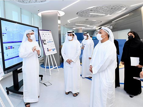 an image of Al Tayer hearing a briefing about the new initiatives of the Agency