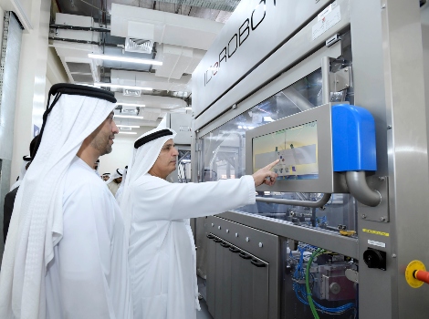 an image of Al Tayer inspecting the Number Plates Factory
