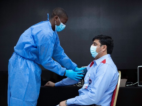 an image during Covid 19 vaccination of RTA drivers