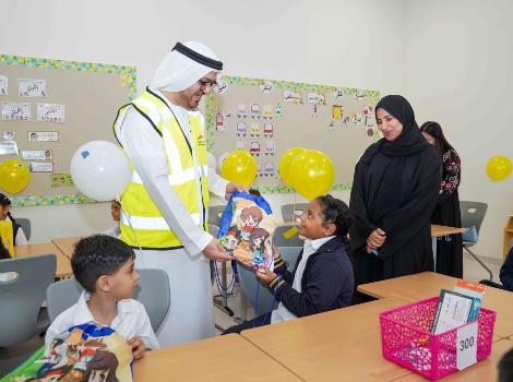 an image of RTA stuff with school students