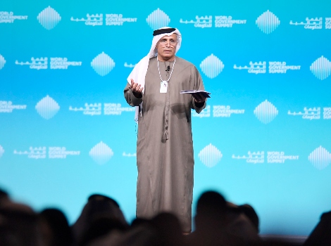 an image of Al Tayer delivering a speech to the Summit