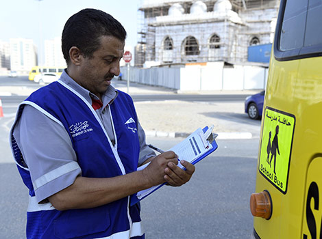 an image while inspecting school buses