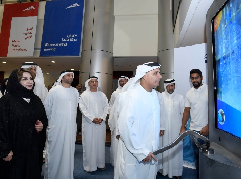 an image of Al Tayer participating in the operation of the virtual water pumping machine