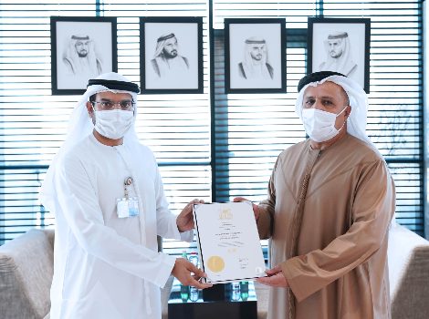 an image of Al Tayer with one of the graduates