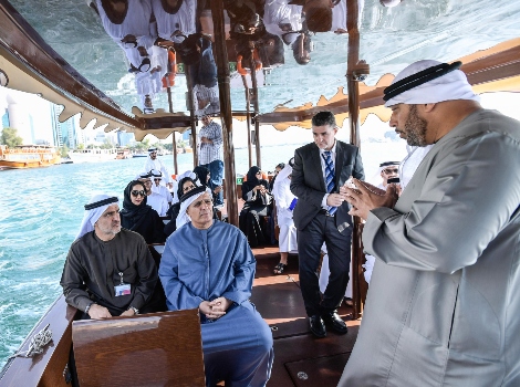 an image of Al Tayer with the team during the test-ride of the hybrid abra