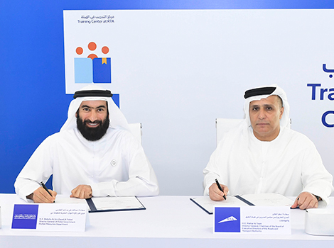 An image of Al Tayer and Al Falasi signing the MoU